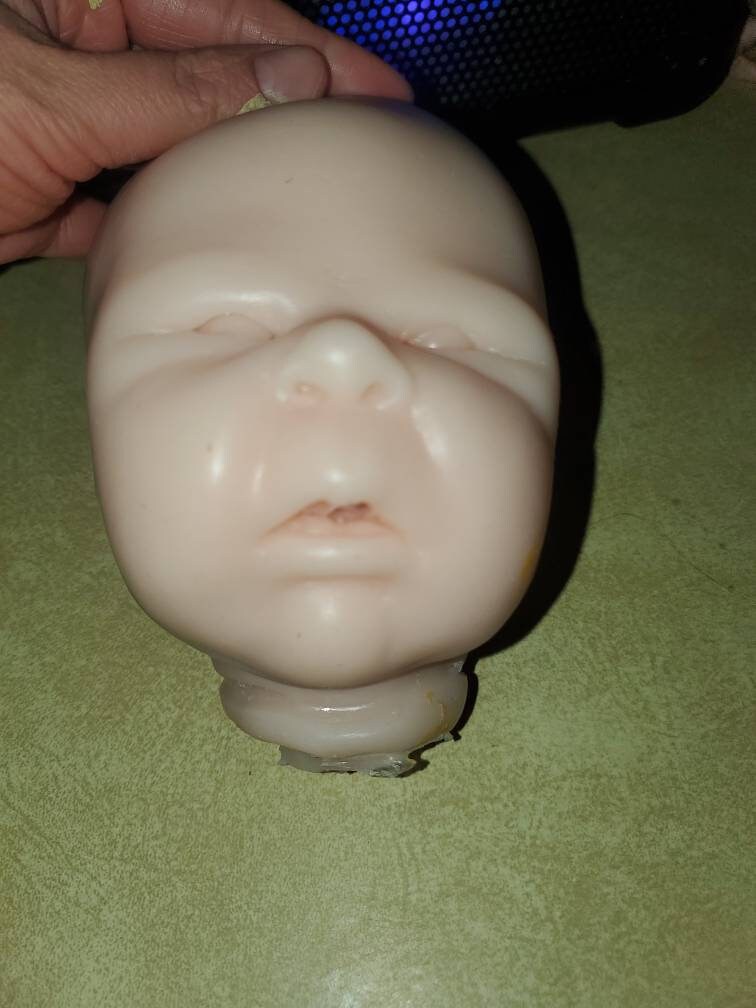 Silicone baby head for cuddle body baby