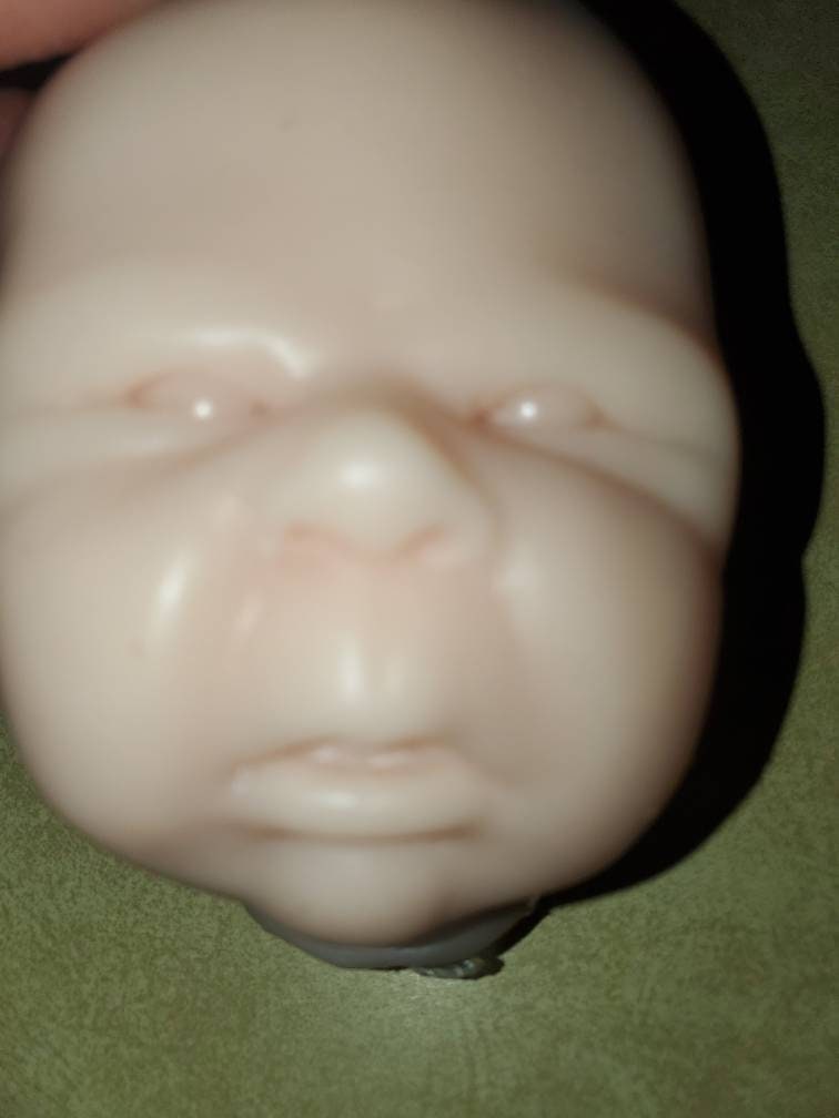 Silicone baby head for cuddle body baby