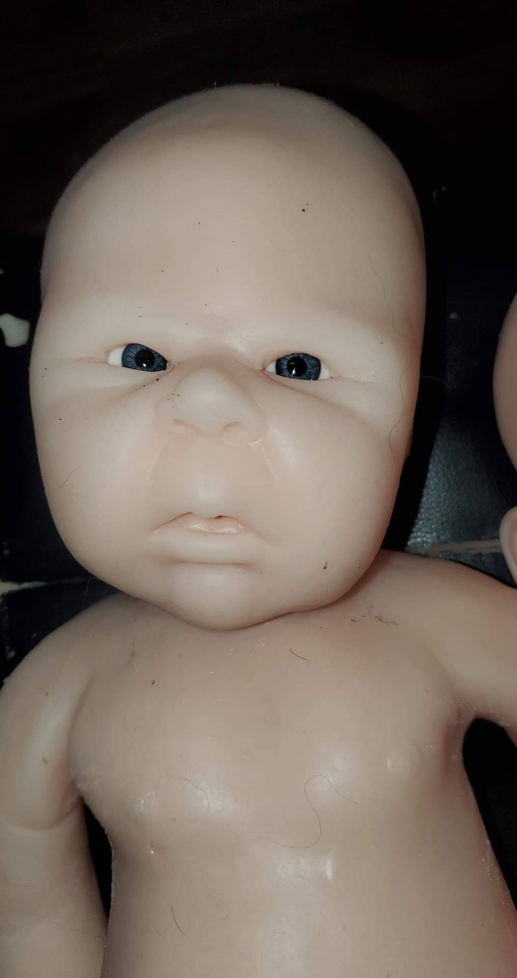 Silicone baby head for cuddle body baby