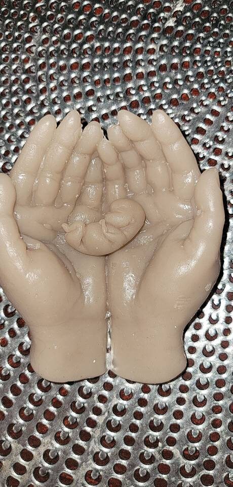 Memorial fetus babies silicone fetus and hands 10 or 11 week gestation