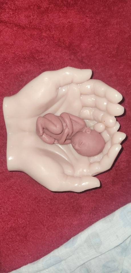 Life size silicone hands holding memorial silicone baby