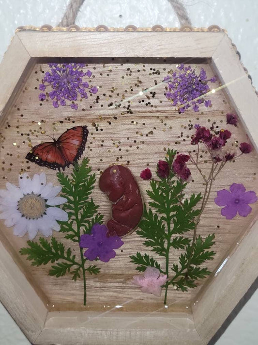 Ready to ship 10 week gestation silicone fetus in Beautiful wood frame with resin back ground
