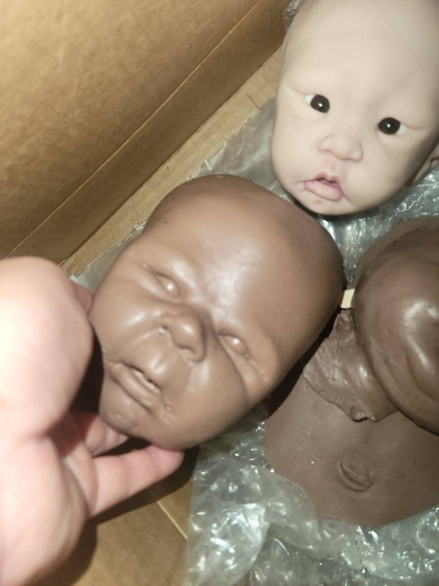 2 surprise silicone heads WoW!! Blank unpainted