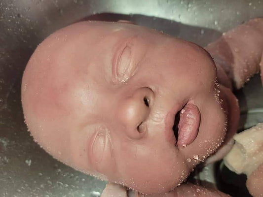 Open eye silicone baby head "irie" 21"