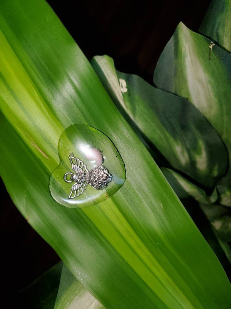Beautiful memorial resin heart peice with angel and fetus