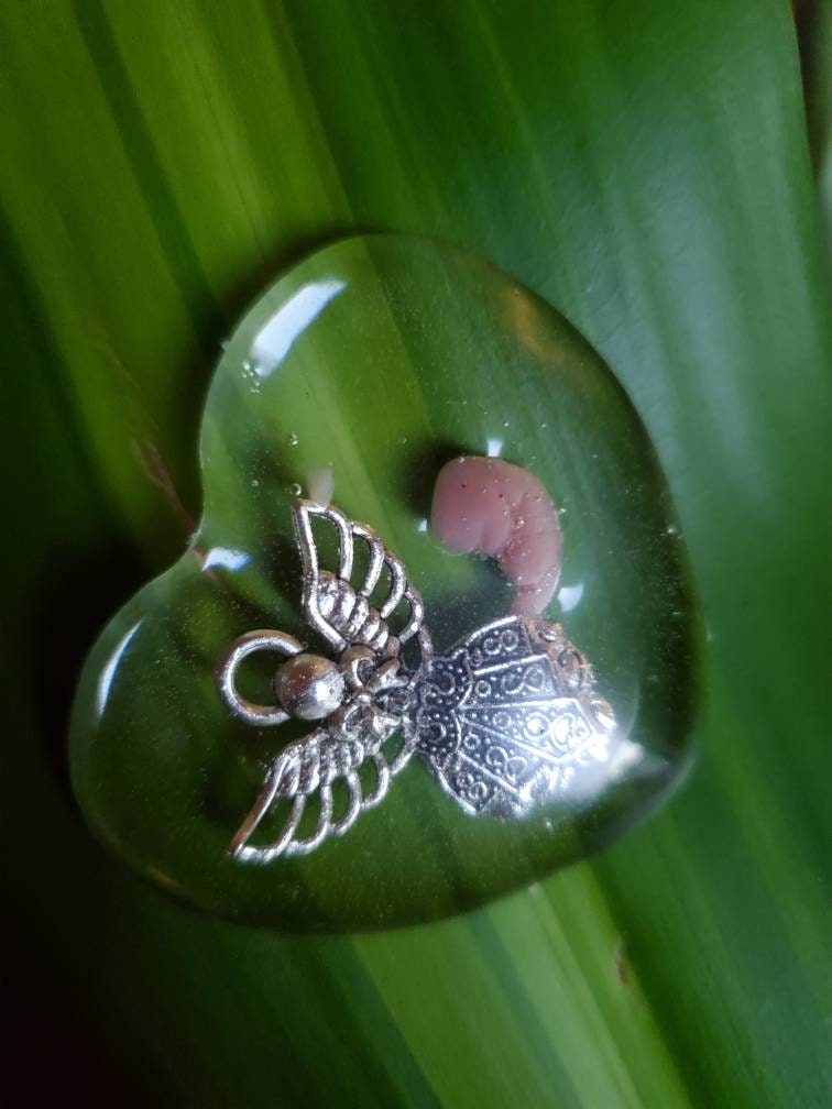Beautiful memorial resin heart peice with angel and fetus