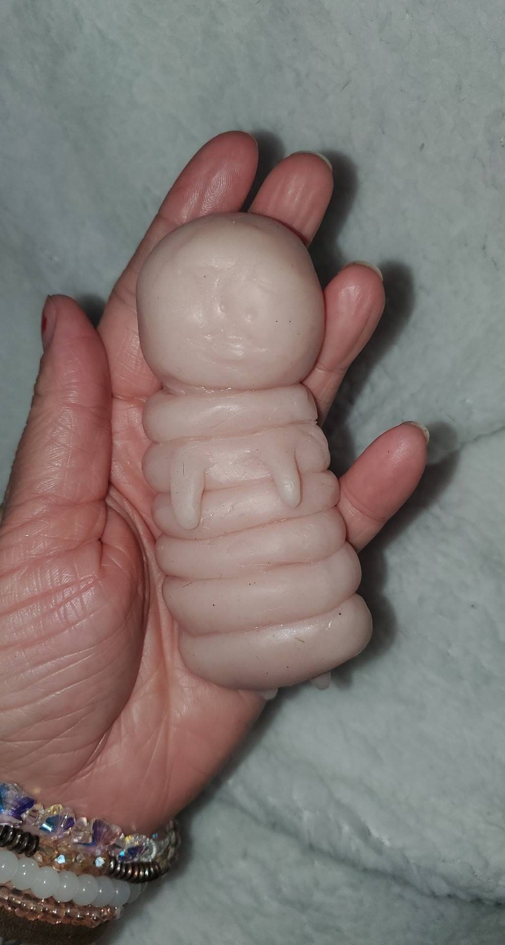 4" silicone caterpillar baby human