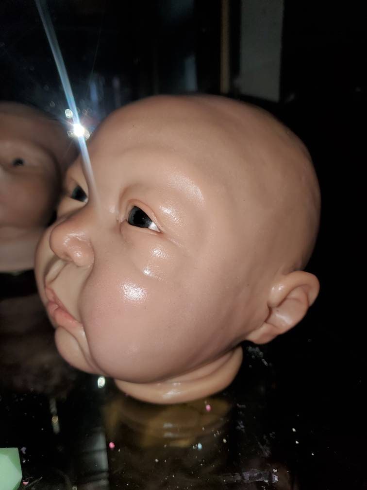 Silicone baby head mold for pouring your own babies