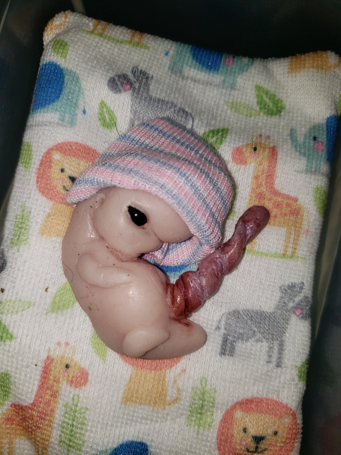 Fully painted 13 week sized gestation silicone fetus memorial baby with umbilical cord