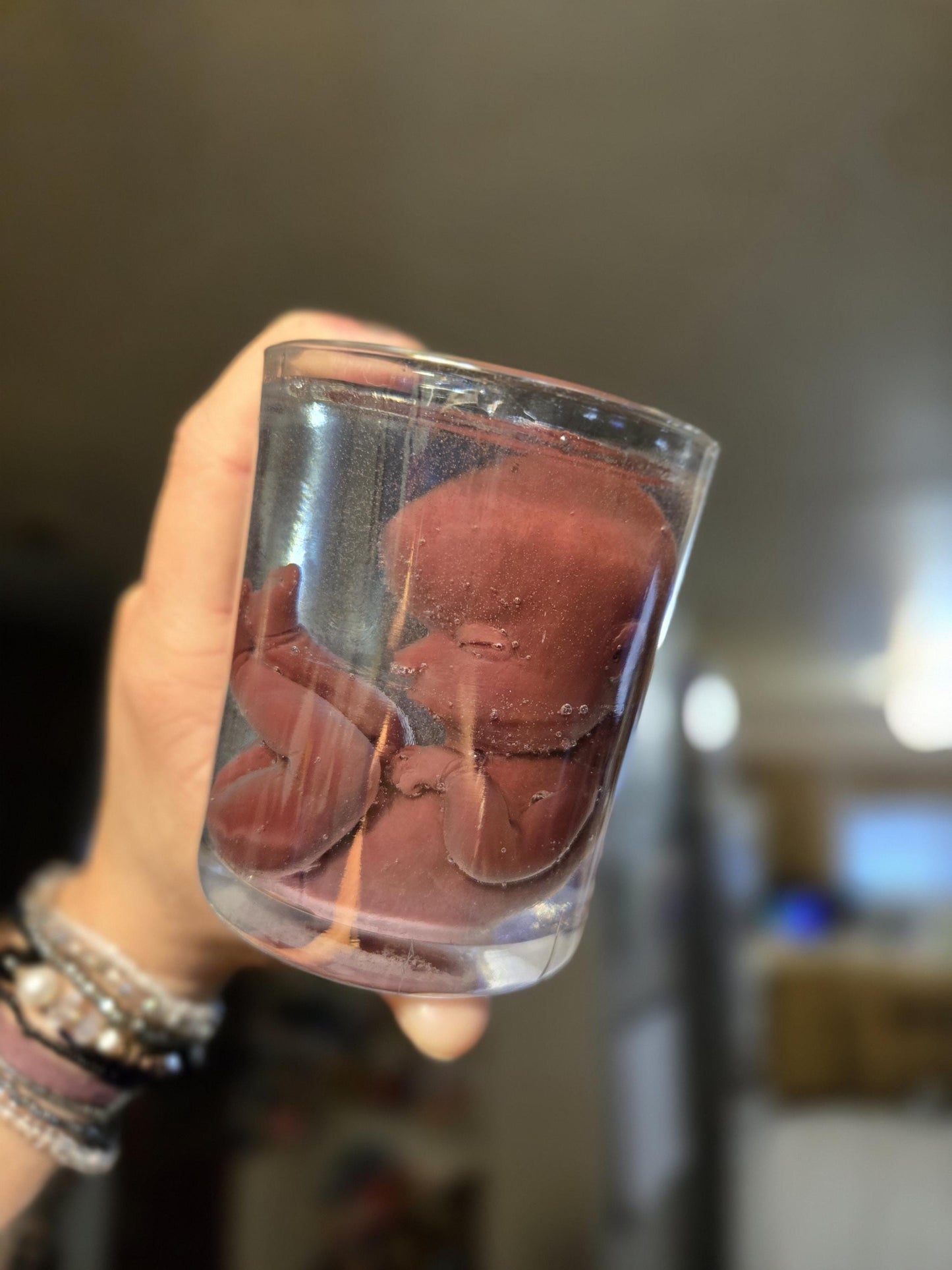 Memorial silicone fetus is glass jar resin