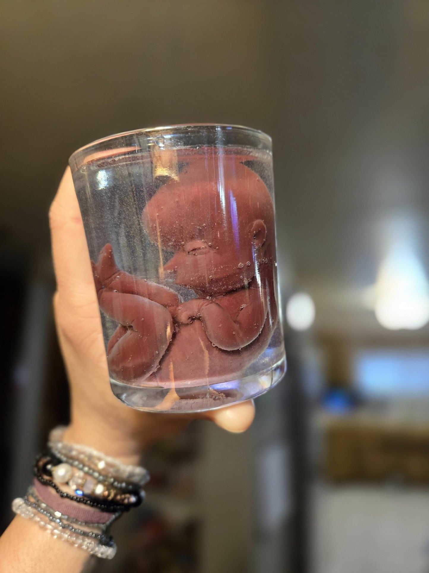Memorial silicone fetus is glass jar resin