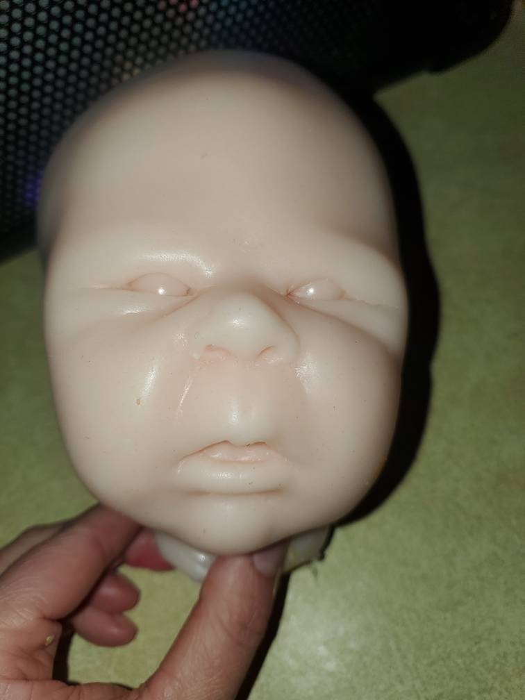 Silicone baby head for cuddle body baby