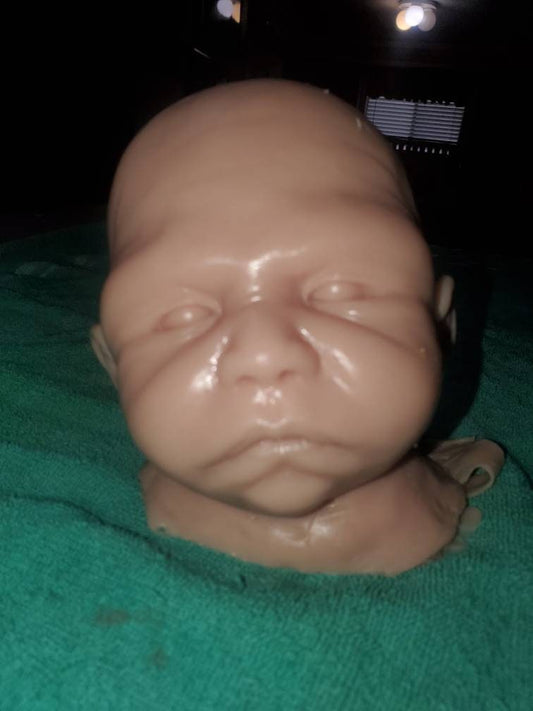 Silicone baby head for cuddle body
