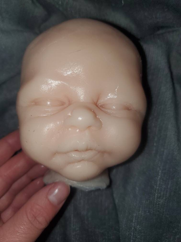 Silicone baby head open eyes