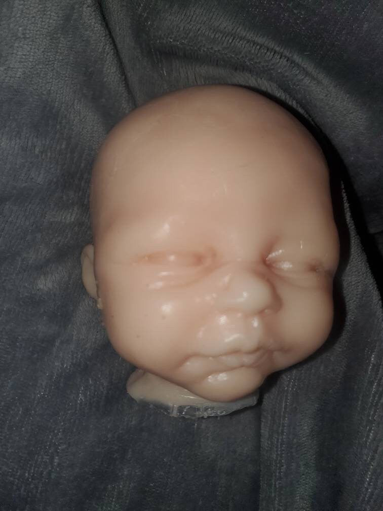 Silicone baby head open eyes