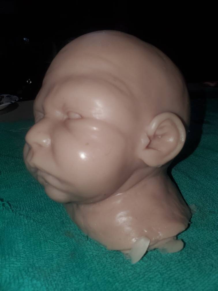 Silicone baby head for cuddle body
