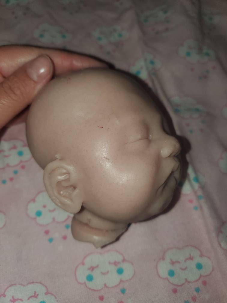 Silicone baby head for cuddle body  10" round 5" top to bottom