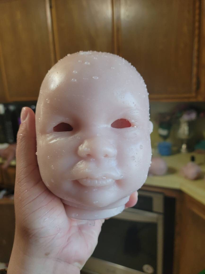 Silicone baby head for cuddle baby open eyes Donna kohn