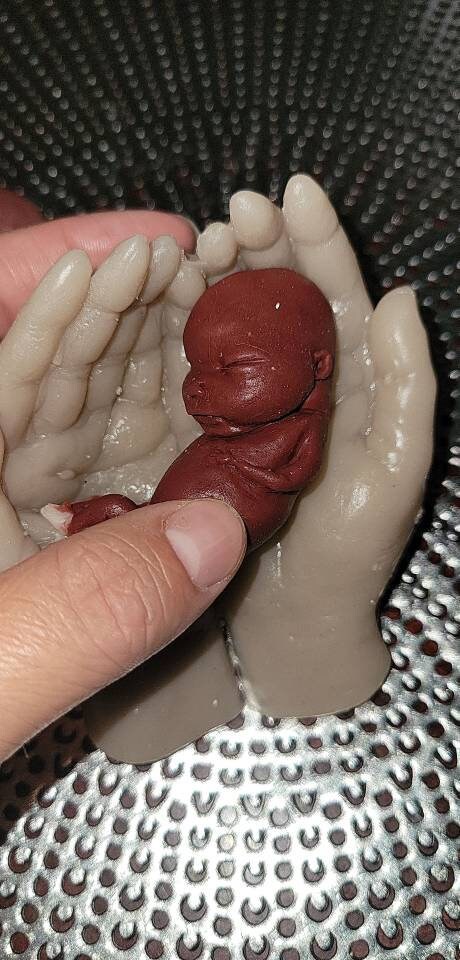 13 week silicone memorial baby fetus in silicone hands keepsake