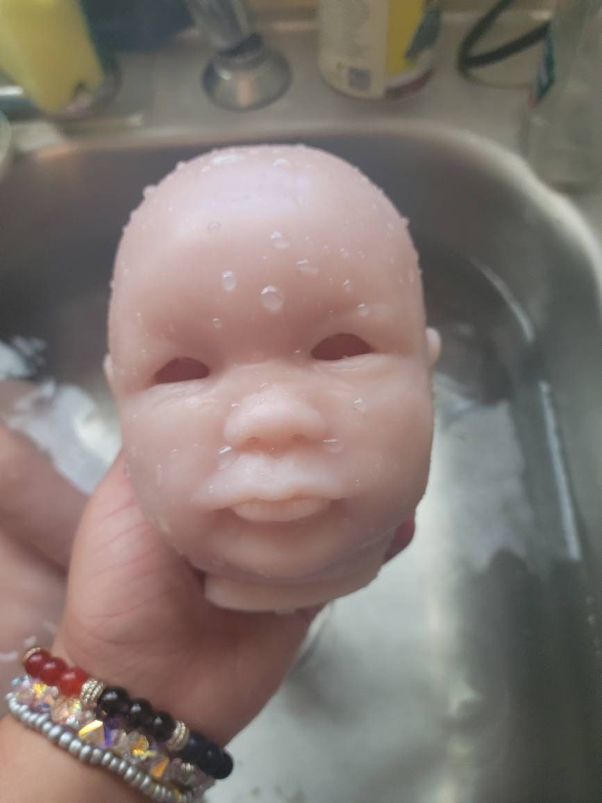 Silicone baby head for cuddle baby open eyes Donna kohn