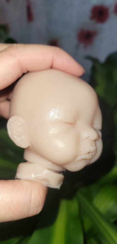 Silicone baby head for aprx 9" cloth body cuddle baby