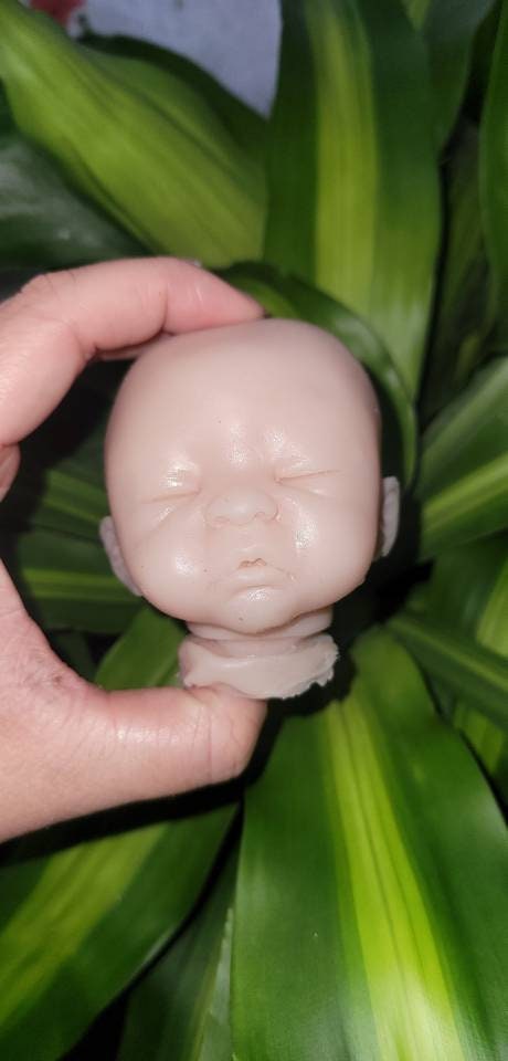 Silicone baby head for aprx 9" cloth body cuddle baby