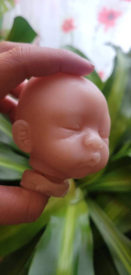 Silicone baby head for aprx 9" cloth body cuddle baby