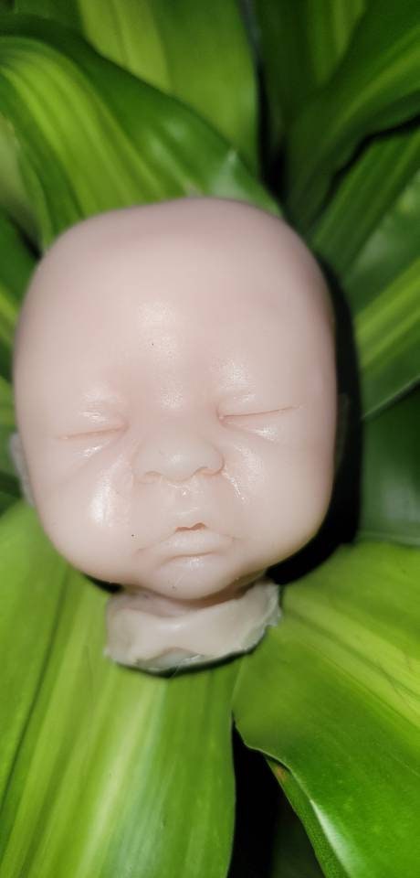Silicone baby head for aprx 9" cloth body cuddle baby