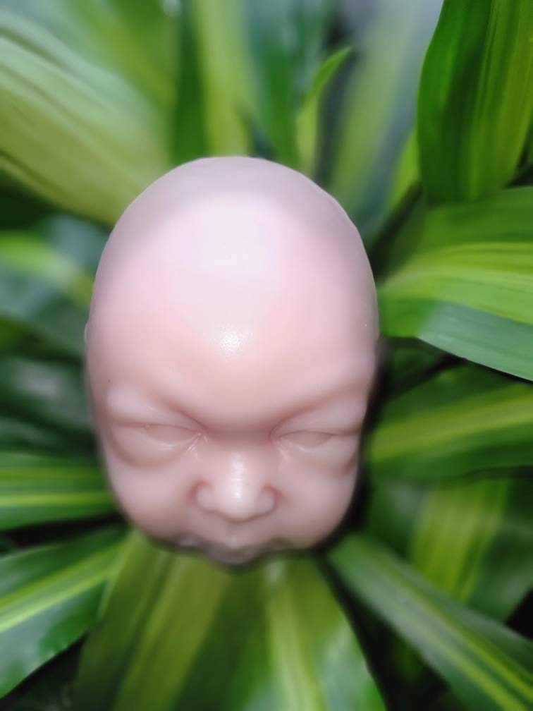 Silicone baby head for cloth or full body