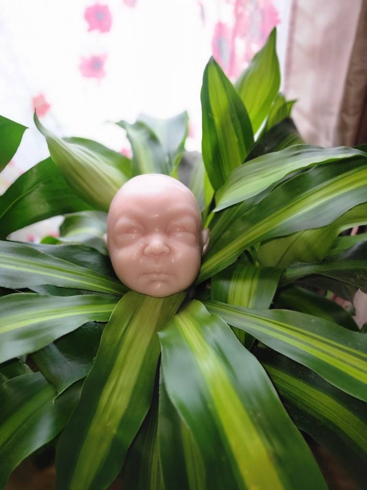 Silicone baby head for cloth or full body