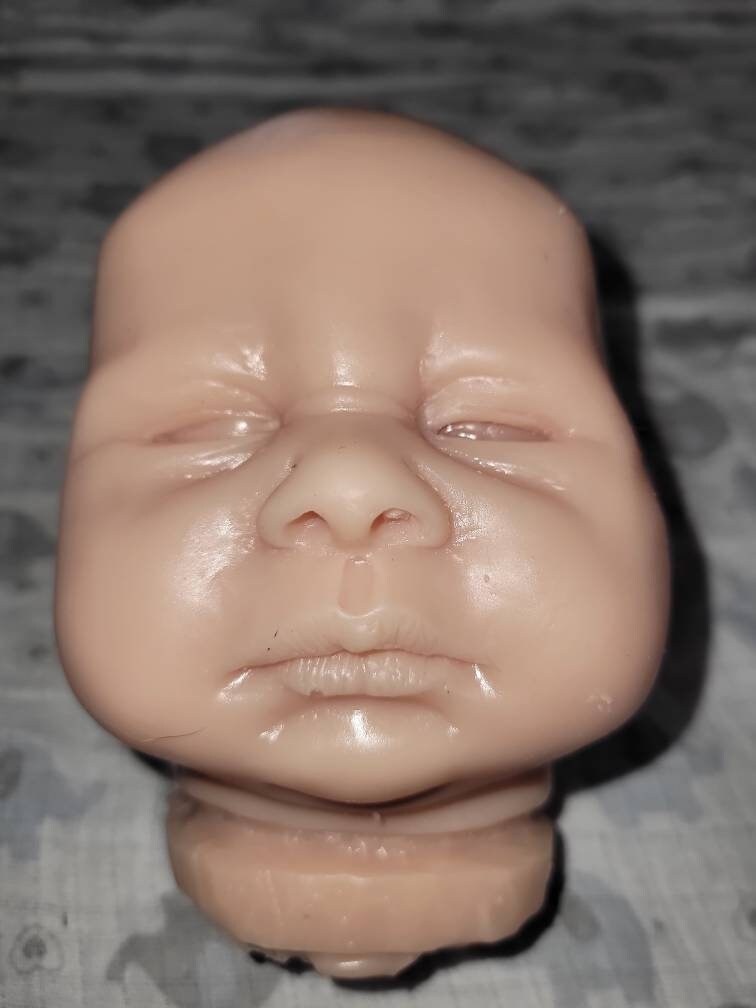 Silicone baby head and limbs by Terry quinn 19"