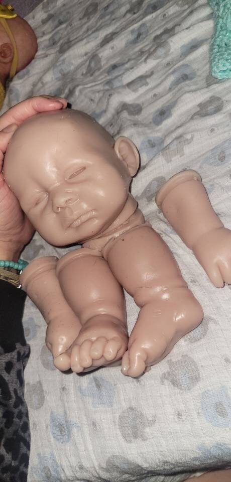 Silicone baby head and limbs by Terry quinn 19"