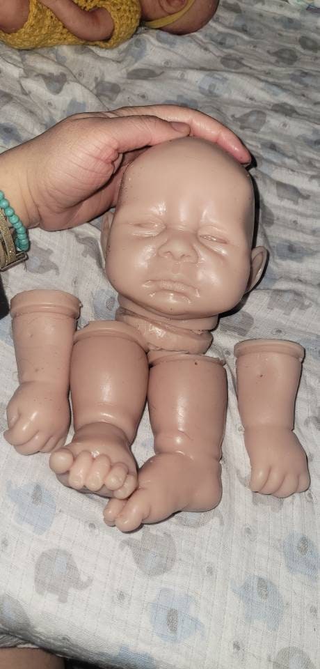 Silicone baby head and limbs by Terry quinn 19"
