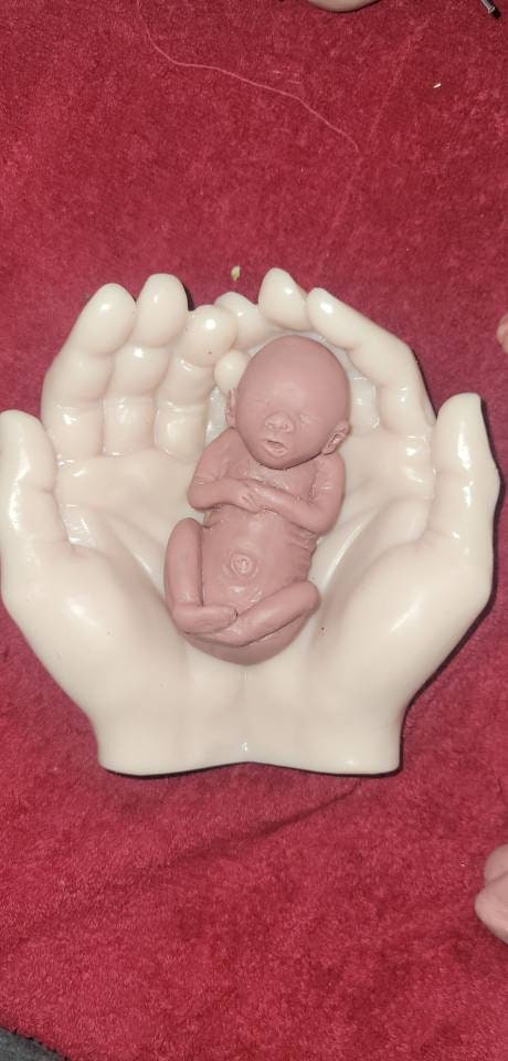 Life size silicone hands holding memorial silicone baby