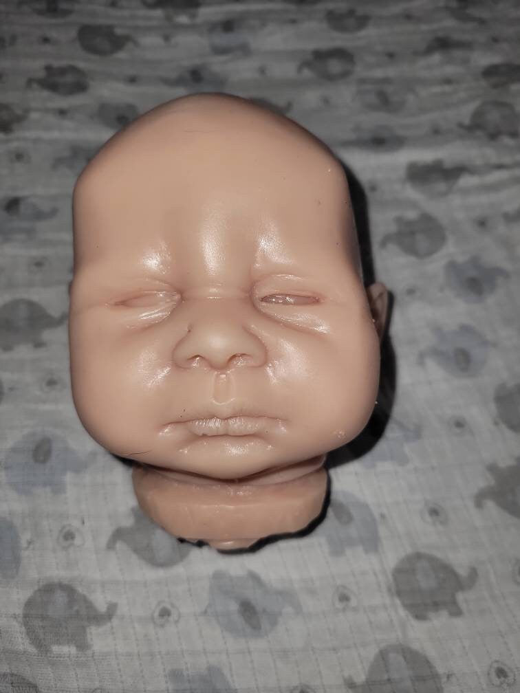 Silicone baby head and limbs by Terry quinn 19"