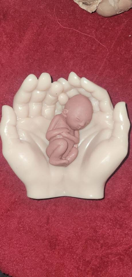 Life size silicone hands holding memorial silicone baby