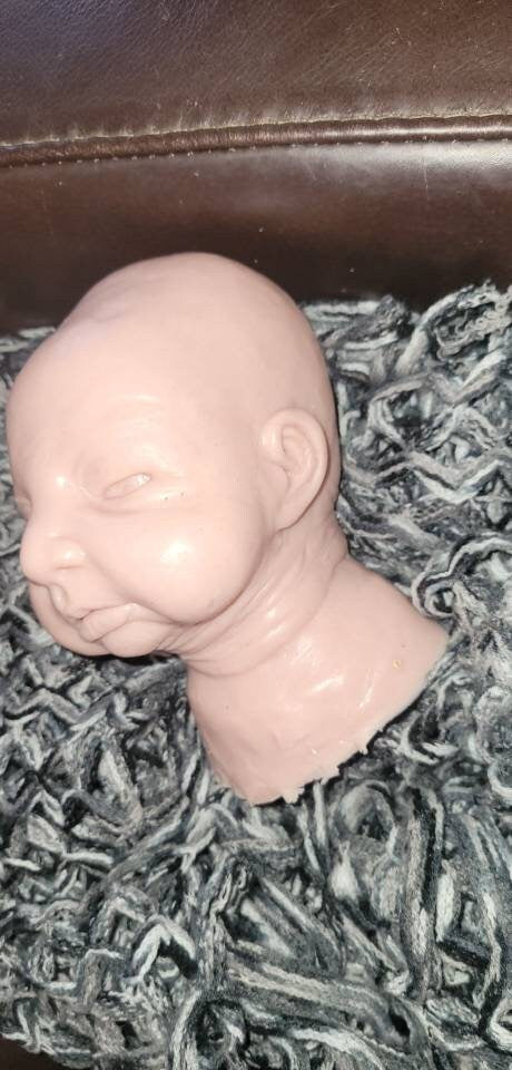 Silicone baby head by Kathryn brody for 16" body