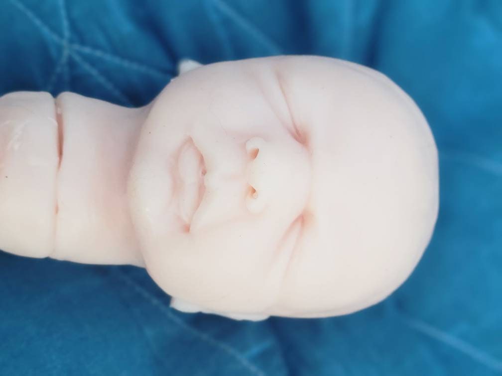 Silicone baby head for 11" cuddle body