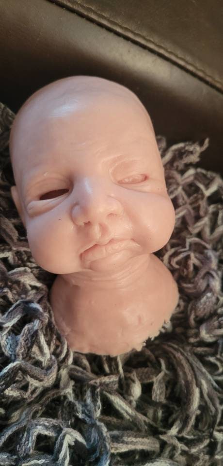 Silicone baby head by Kathryn brody for 16" body