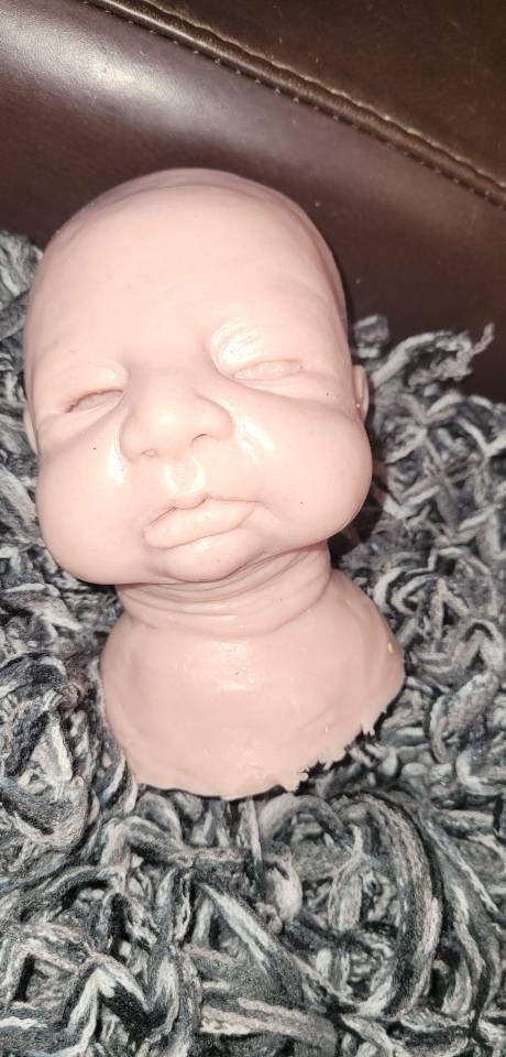 Silicone baby head by Kathryn brody for 16" body