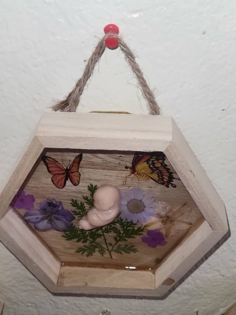 Ready to ship silicone memorial fetus in Beautiful wood frame with resin back drop 11 week