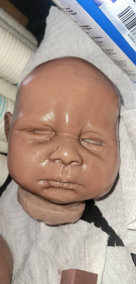 Silicone baby head and limbs by Terry quinn 19"