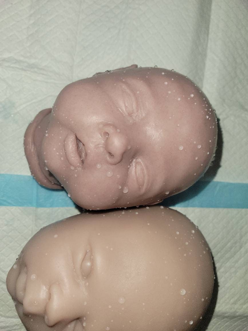 2 surprise silicone heads WoW!! Blank unpainted