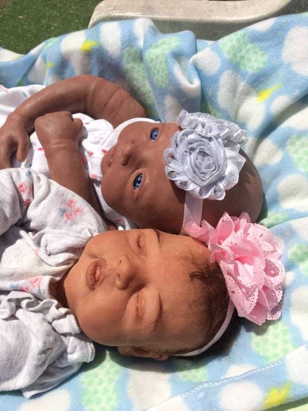 Open eye silicone baby head "irie" 21"
