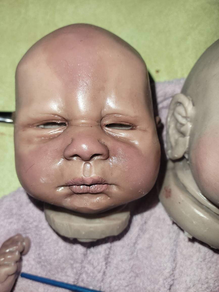 Silicone baby head and limbs by Terry quinn 19"