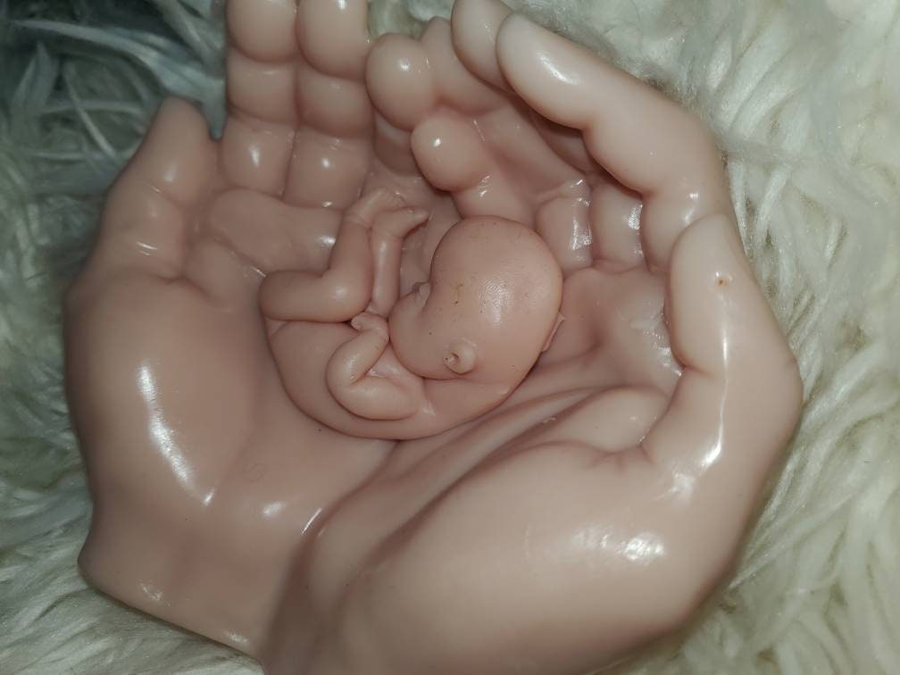 Life size silicone hands holding memorial silicone baby