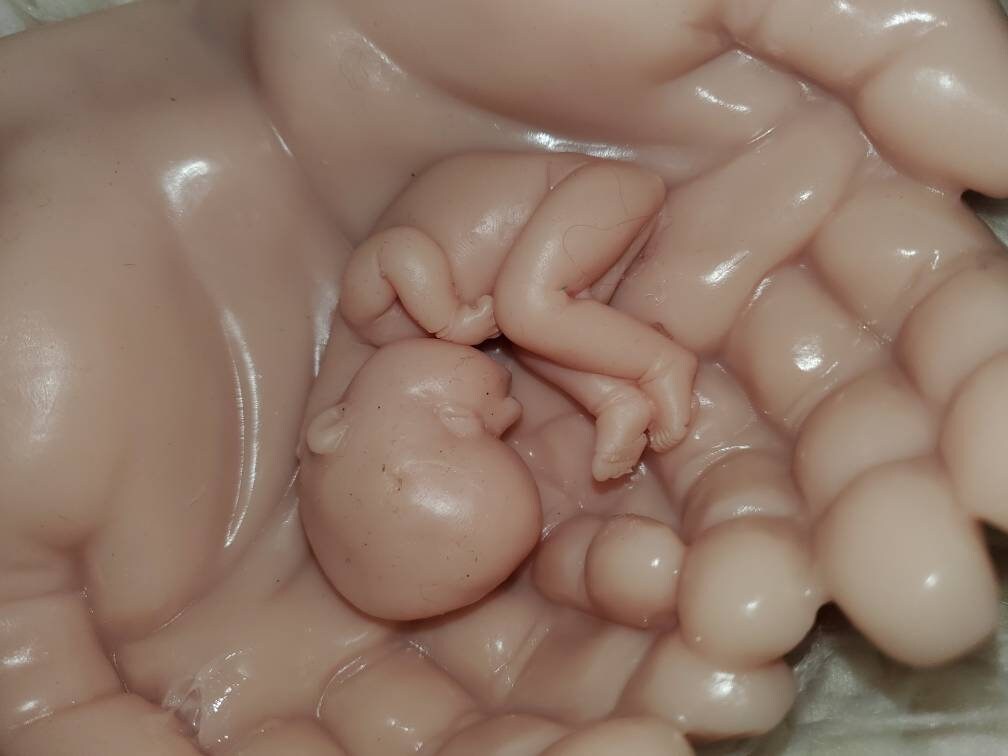 Life size silicone hands holding memorial silicone baby
