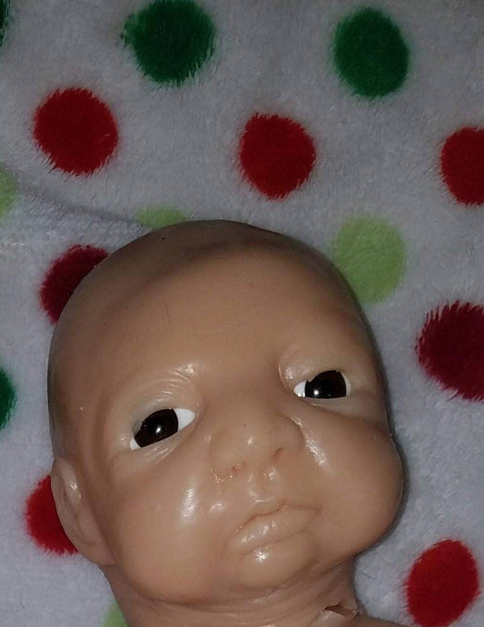 Silicone baby head by Kathryn brody for 16" body