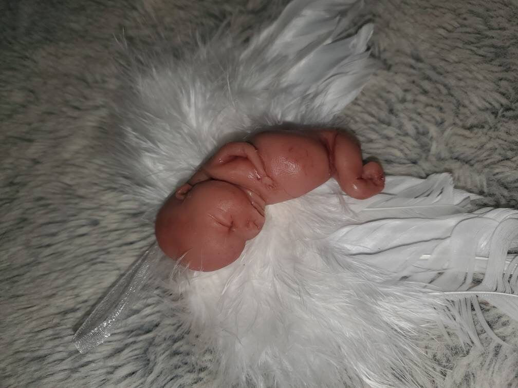 14 week gestation fetus memorial silicone baby fully painted with wings?