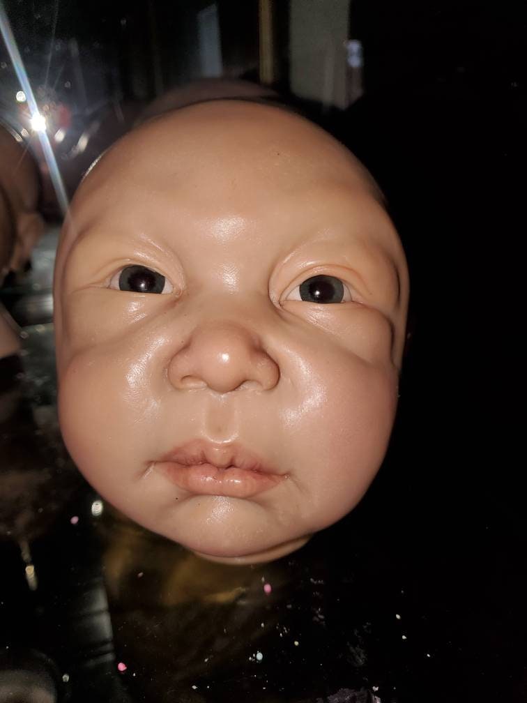 Silicone baby head mold for pouring your own babies